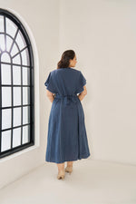 Load image into Gallery viewer, Light blue cotton Elara dress with subtle piping, ruffled cap sleeves, concealed buttons, and adjustable back belt for a flattering plus-size fit
